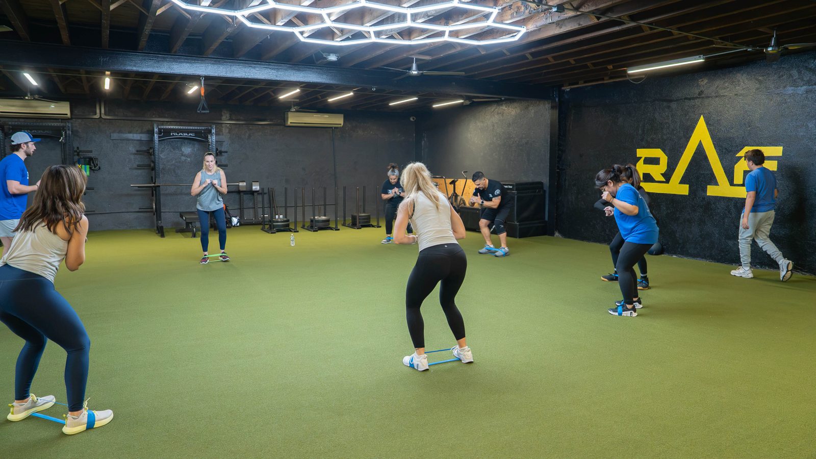 Small-group training on the turf at RAF Strength & Fitness gym in West Hempstead